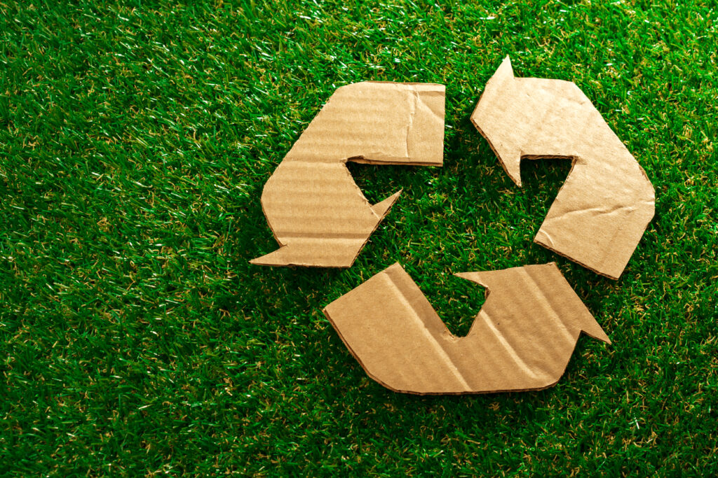Recycling eco concept with cardboard recycle sign
