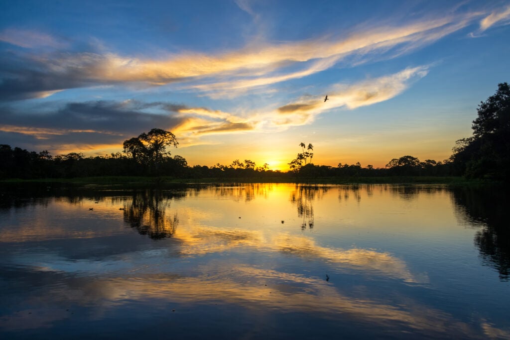 Sunset and Reflection in the Amazon